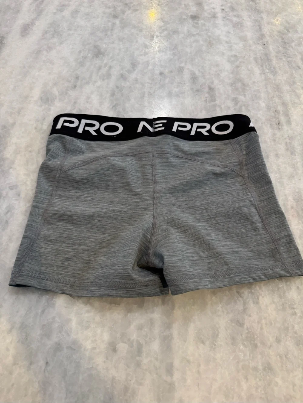 Nike Pro Gray Women's Athletic Shorts with Black Branded Waistband